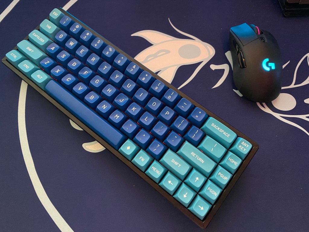 Gaming keyboard next to a gaming mouse.