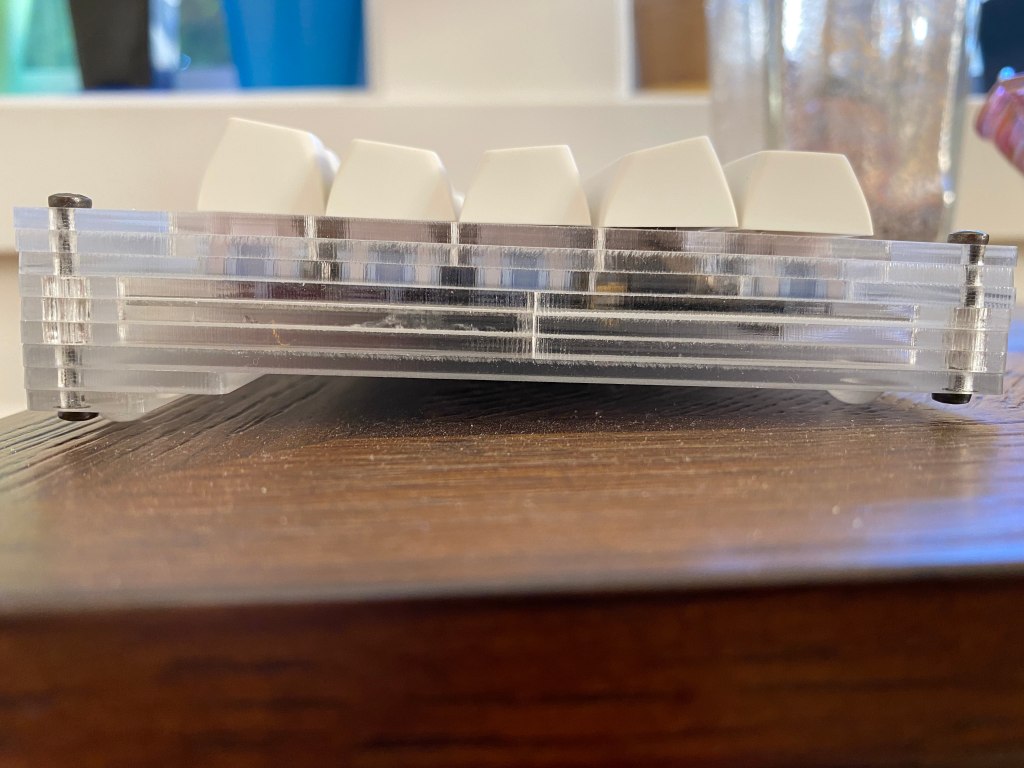 Side view of the Arisu keyboard with keycaps.