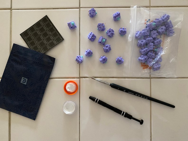 Switches, lube, film, and tools for lubing mechanical keyboard switches.