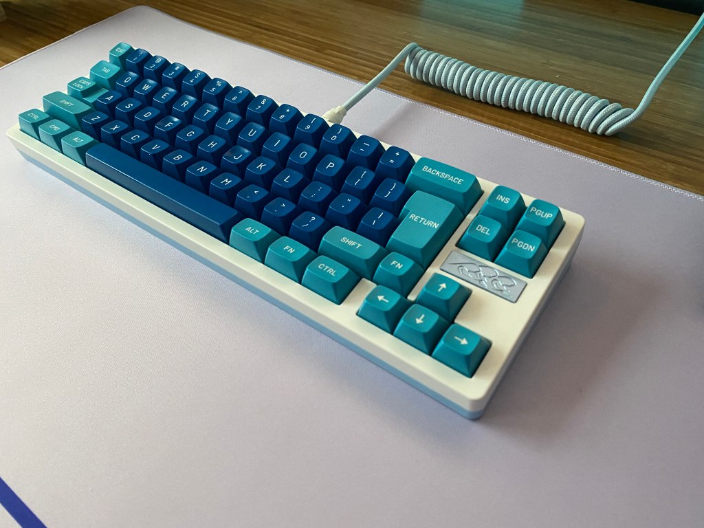 Angled view of Wuque Ikki68 Keyboard on a desk.