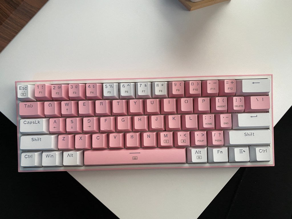 Redragon K617 Fizz mechanical keyboard on a white table