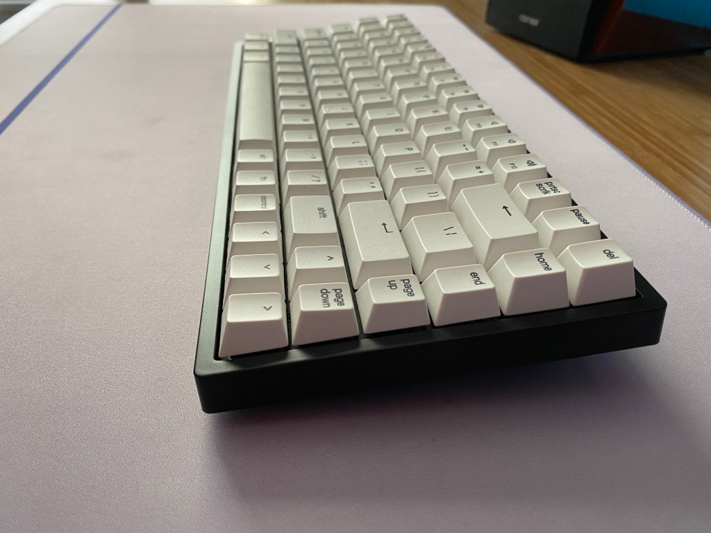 Angled view of Vissles V84 mechanical keyboard sitting on a desk